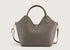 Back view of the grey leather handbag showcasing smooth leather texture and subtle stitching details.