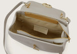 Close-up of the grey leather shoulder bag highlighting the secure zip closure.