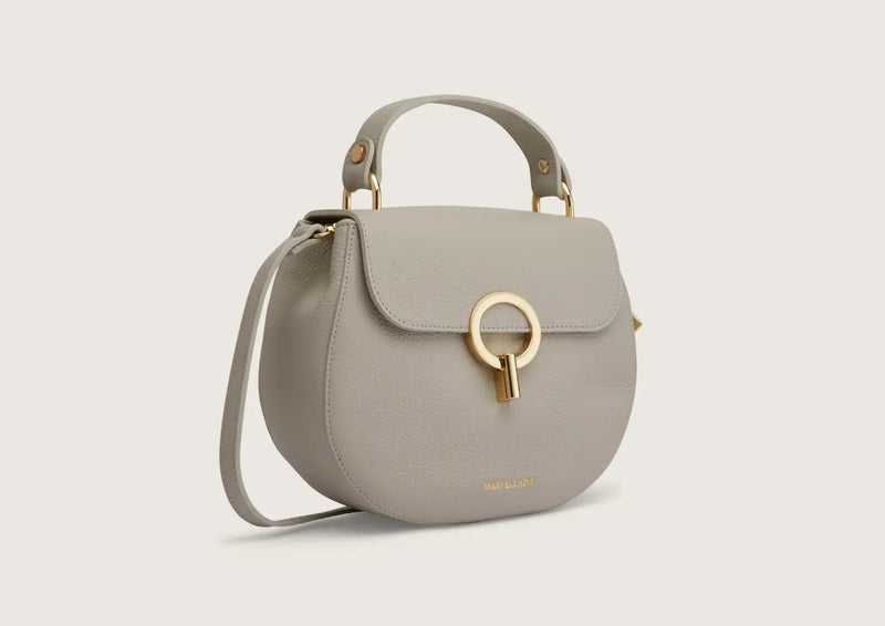 Elegant grey leather shoulder bag with adjustable strap and minimalist design.